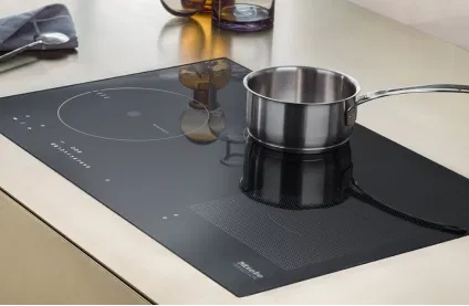 how does induction cooking work
